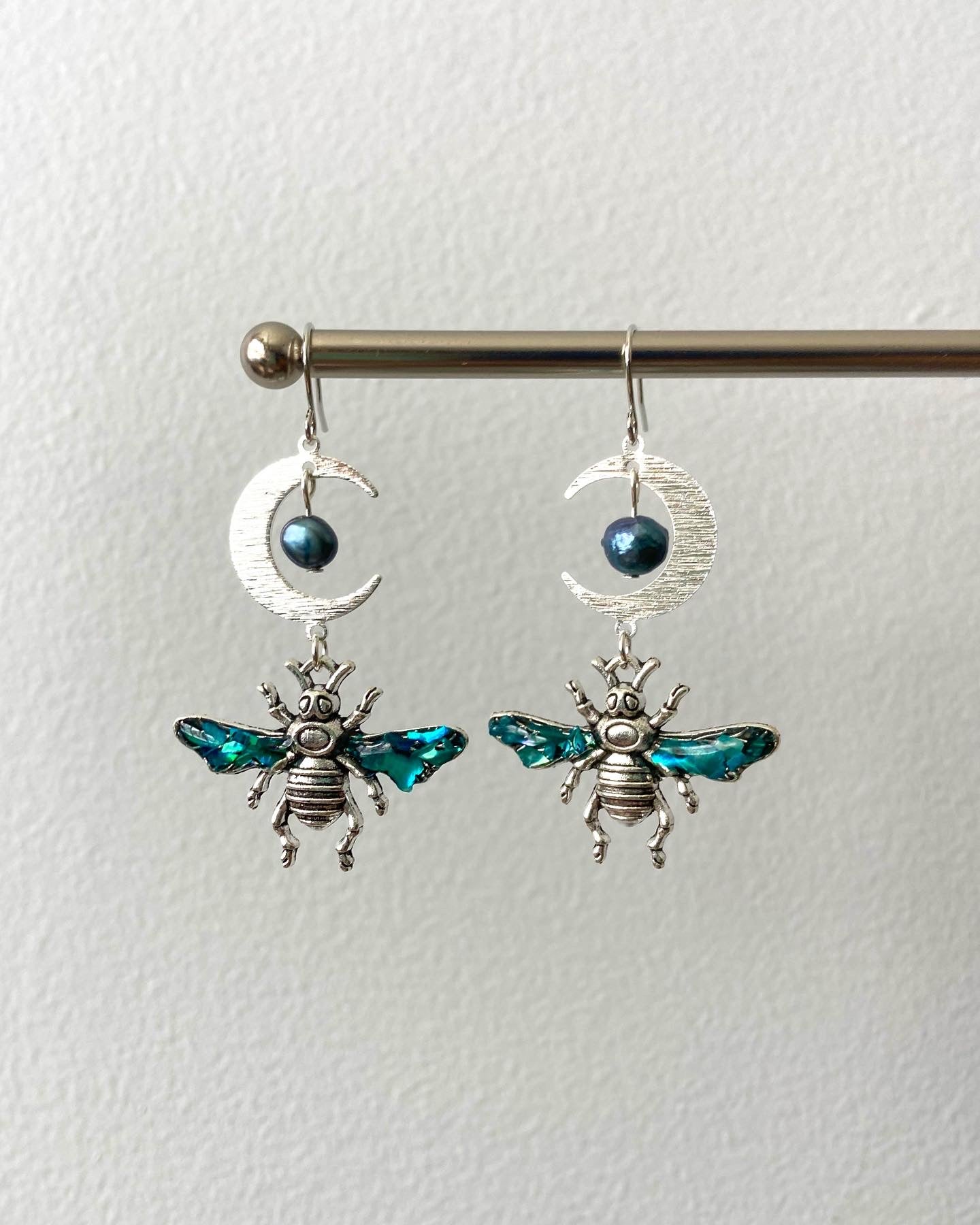 Luminesce insect earrings