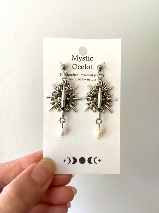 Bleeding Black Heart Dagger Earrings